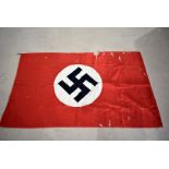 A WWII Third Reich Double sides Swastika flag, unmarked, having small tears and holes, approx. 166cm