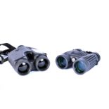 A pair of Bushnell range finders, together with a pair of Bushnell FOV368FT waterproof binoculars,