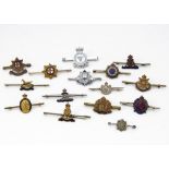 A collection of white and gilt metal sweetheart bar brooches, comprising Royal Artillery, RASC,
