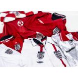 England / Suisse Football Shirts, eight shirts in total with five England shirts Umbro - red (XL)