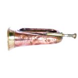 A WWI military issue copper and brass bugle, by Boosey & Co, dated 1916, marked with broad arrow, in