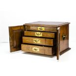 A Victorian walnut cutlery box, with a pair of hinged front doors opening to reveal four graduated