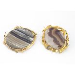 Two 19th Century agate and pinchbeck oval framed brooches, one with boxed back, 8cm x 6.5cm the
