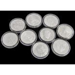Nine modern 1oz fine silver coins, from around the globe such as a 2018 US dollar and a Cook