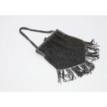 An Art Deco period steel evening purse, with mesh bag, 12cm wide