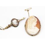 A 9ct gold shell cameo brooch, the oval frame containing a carved profile of a young woman 4.6cm x