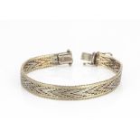 A 9ct gold three colour bracelet of chevron design, with box clasp marked 9kt, 19.8cm x 0.8cm, 17.9g
