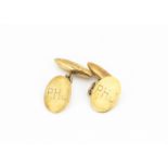 A pair of 18ct gold oval fronted chain linked and torpedo back cufflinks, engraved with initials