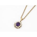 An amethyst and half pearl cluster pendant, in 9ct gold, supported on an oval linked 9ct gold