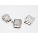Three Victorian and later silver vesta cases, each engraved, 44mm, 42mm and 37mm (3)
