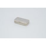 A George III silver pocket snuff box by E T & Co, rectangular with engraved geometric design and