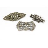 An Art Deco paste double clip brooch, of oval rectangular style, another paste and chrome brooch and