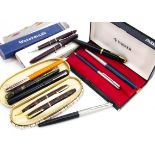 A collection of vintage and modern pens, including a Conway-Stewart writing set in original boxes,