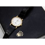 A c1990s Rolex Cellini 18ct gold cased lady's wristwatch, 26mm, ref. 5109, white dial with gilt
