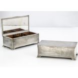 A pair of 1940s silver cigarette boxes from Mappin & Webb, each 18.5cm and approximately 20 ozt,