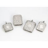 Four Victorian and later silver vesta cases, each engraved, three with fob loops, 5.5cm to 4.3cm (4)
