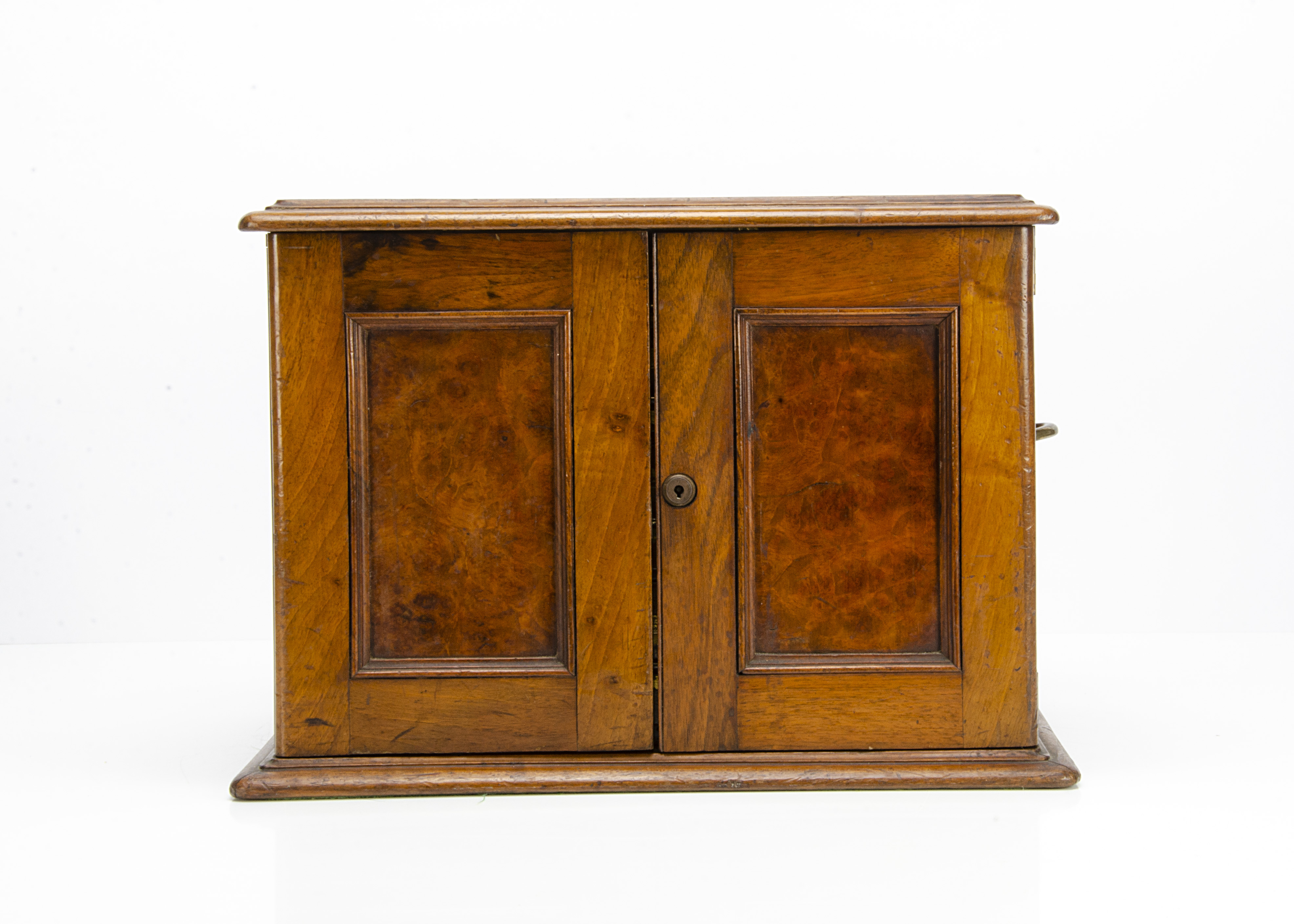 A Victorian walnut cutlery box, with a pair of hinged front doors opening to reveal four graduated - Image 2 of 2