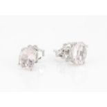 A pair of pink morganite oval mixed cut ear studs set in silver