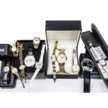 A collection of fashion watches, including a gilt Rotary in box and others