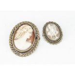 Two shell cameo oval brooches, both in base metal, the larger carved with profile of young girl, 5.