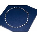 A cultured pearl and 14ct gold choker necklace, the cultured pearls of irregular shape on a gold