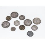 Eleven 17th and 18th Century British coins, including four half crowns, and four shillings, a six