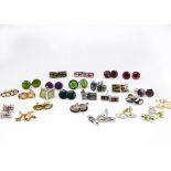 A collection of cufflinks, including various enamel and silver examples, other novelties such as