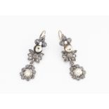 A pair of 19th Century Italian diamond and drop pearl earrings, the rough cut diamonds in silver