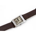 A 1930s Longines gentleman's wristwatch, 25mm wide rectangular chromed style case, dial worn and