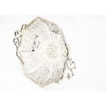 An Edward VII silver centre piece bowl, the pierced octagonal footed bowl with twin handles and