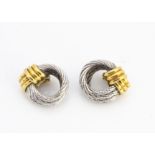 A pair of Fred of Paris Force 10 clip earrings, of knot design with 18ct gold clips and steel rope