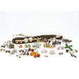 A quantity of miscellaneous costume jewellery, amber earrings, silver studs, and other items