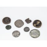 A collection of ancient and antique coins, including several Roman examples, a rectangular Celtic