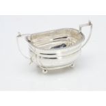 A George V silver sugar basin from Charles Stuart Harris, dented, with twin handles, 14cm, 4.3