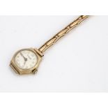 A c1930s 9ct gold cased lady's wristwatch, marked Tho Russells Son, on an expanding yellow metal