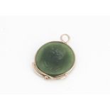 A nephrite and gold pendant, with intaglio design of a classical gentleman in profile, 3cm x 2.
