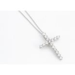 An all diamond set cross pendant, in hallmarked white 18ct gold, on a fine 18ct white gold chain,