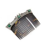 An early 20th Century continental tortoiseshell and paste set base metal mounted hair comb, the