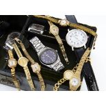 A collection of watches, mostly fashion quartz examples, gents and ladies, in various conditions,