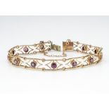 A 9ct gold amethyst bracelet, the rectangular links of pierced design centred with collet set