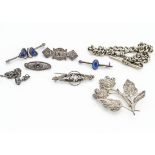A small quantity of silver jewels, including a Charles Horner brooch, with mauve coloured paste