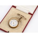 A late 19th Century continental yellow metal open faced pocket lady's watch, 31mm, marked 14k to