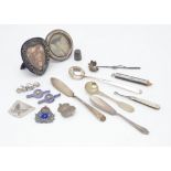 A small group of silver and silver plate and other items, including a silver ARP badge, a silver and