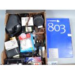 Camera Related Accessories, including lenses, tripods, old film stock, cases, opened boxes of