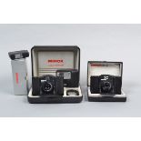 Minox Cameras, a Minox 35 GT, in display case with FC 35 flash, shutter fires, not battery tested,