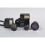 A Pentax 110 SLR Camera with Four Lenses, a Pentax Auto 110 Super 110 cartridge SLR camera,