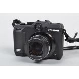 A Canon Powershot G15 Digital Camera, powers up, appears to function as should, body VG, with 6.1-