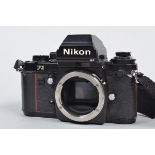 A Nikon F3 SLR Camera body, serial no 1691045, shutter working, with HP finder, meter responsive,