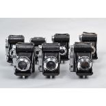A Tray of Balda Folding Cameras, two Super Baldix, shutters working, one stutters on slow speed,