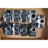 A Tray of SLR Camera Bodies, a Minolta XG9, SR-1, SRT-101, XG-M, XG-E, Olympus OM-20, Fujica ST 705,